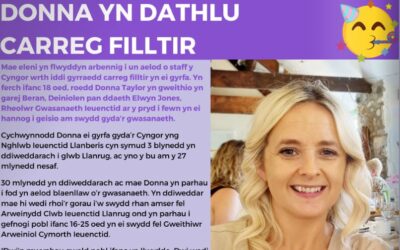 Donna yn Dathlu Carreg Filltir